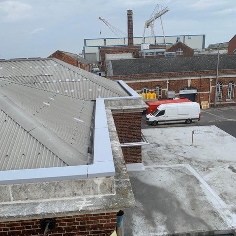 Skyline aluminium coping in metallic silver at HMNB Portsmouth naval base